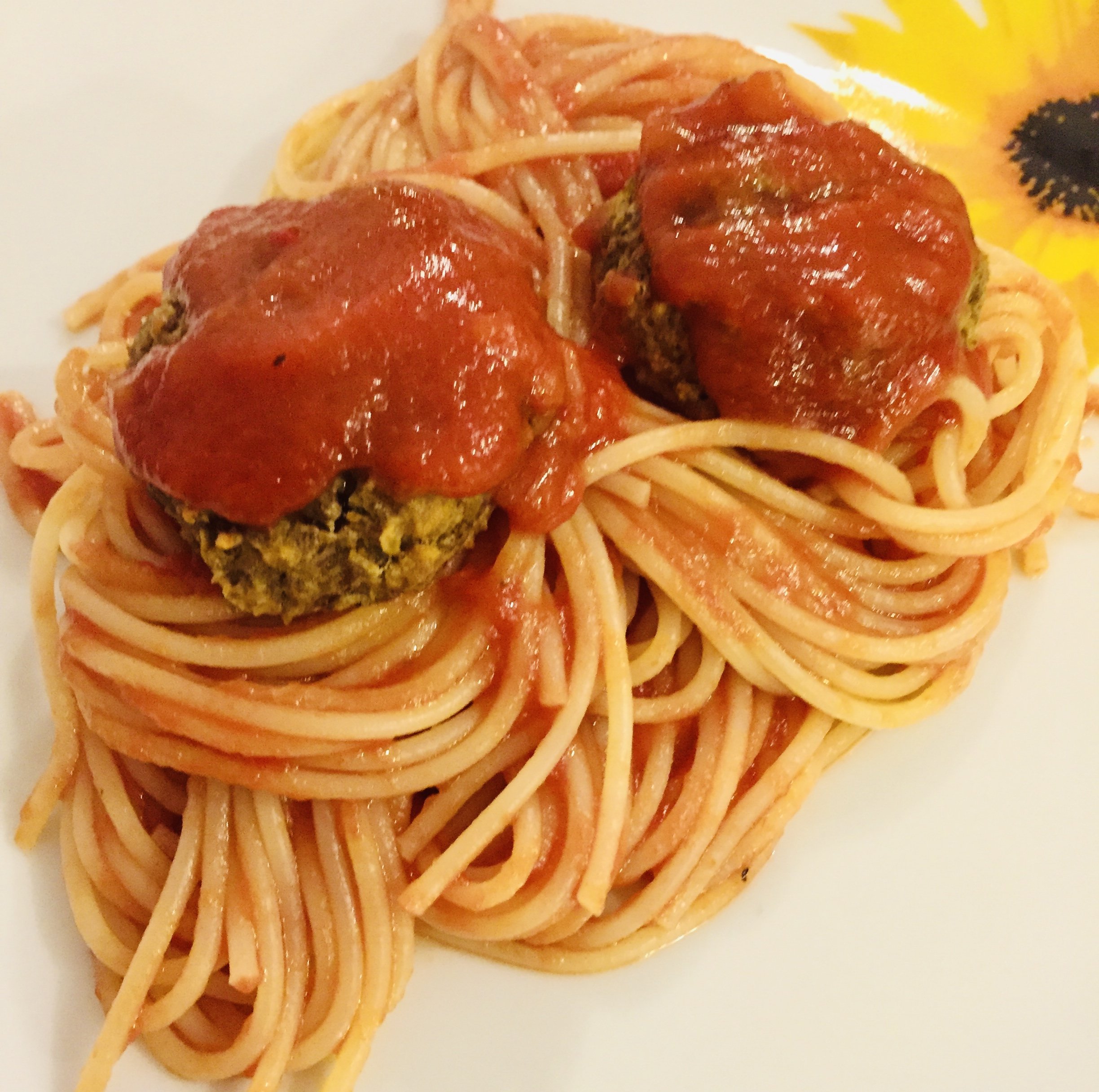 Spaghetti and meatless lentil meatballs on a dish